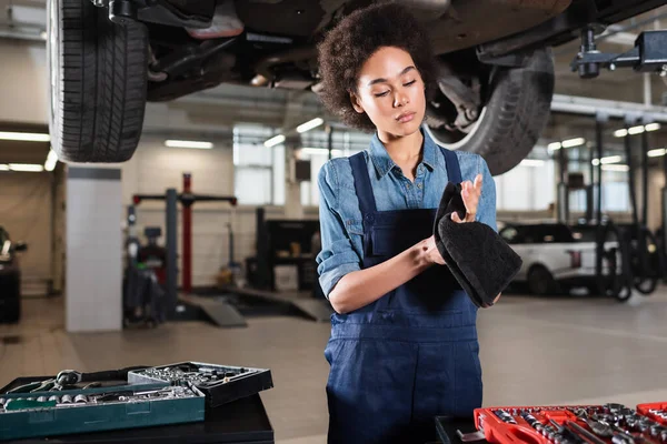 Mechanic Wiping Hands