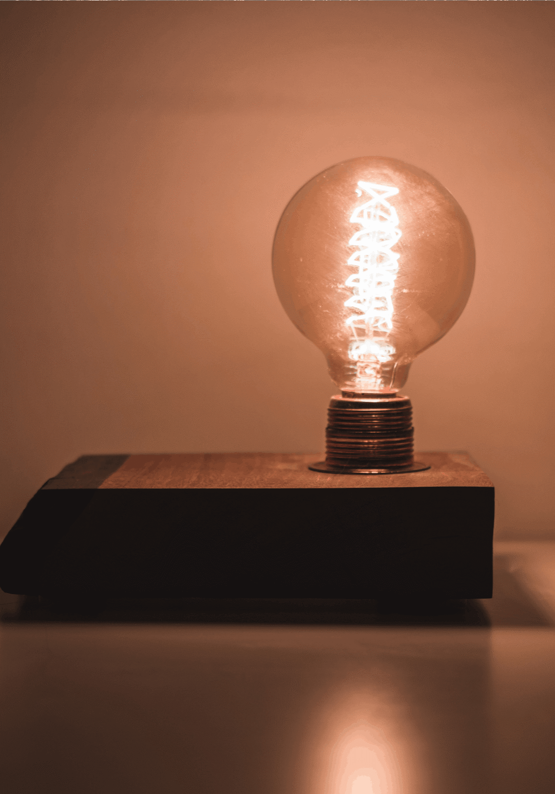 Lightbulb over wood box